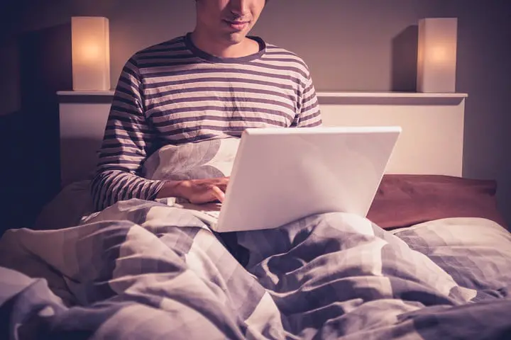 How to Use Laptop in Bed Without Overheating?